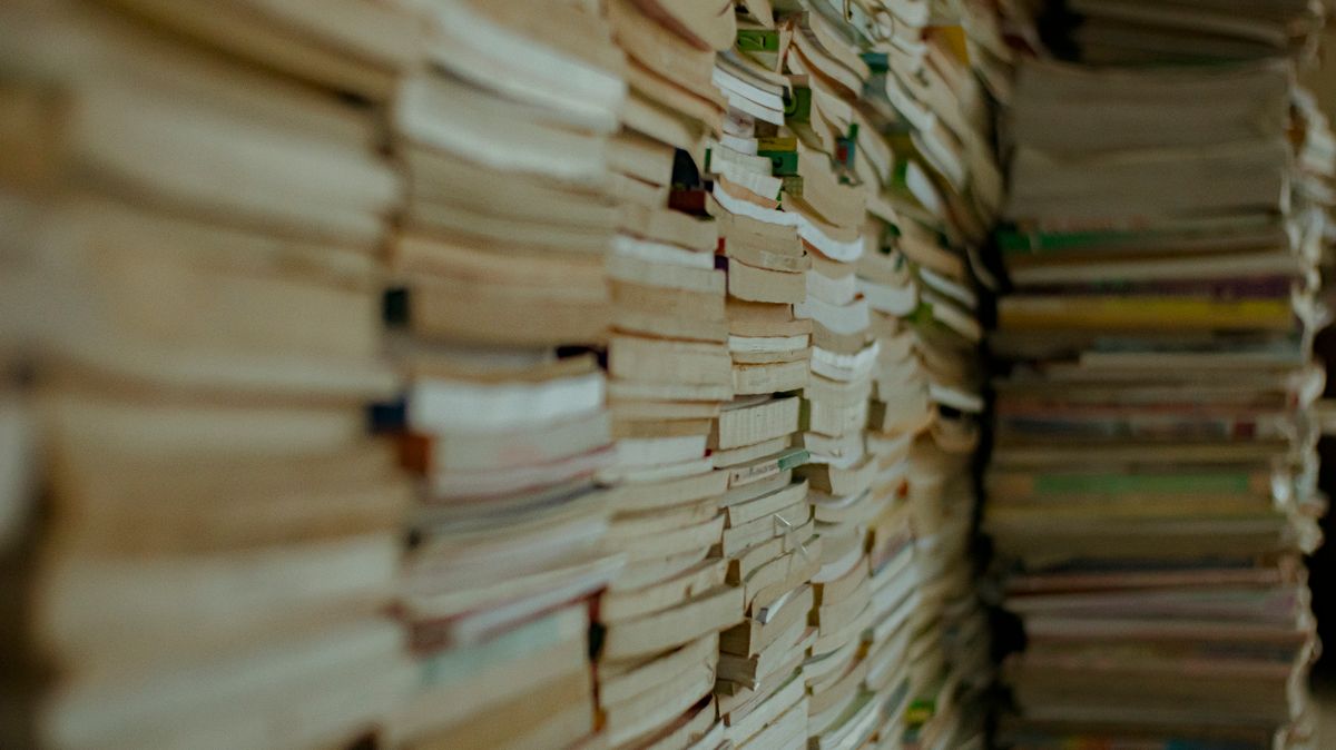 Stacks of used books ready to sell for cash at buyback sites